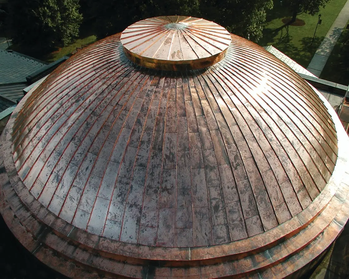 Craftsman Roofing crew installing a new roof in North Cohasset